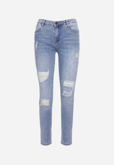 Jean skinny bleu avec trous et effet push up