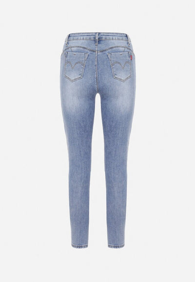 Jean skinny bleu avec trous et effet push up